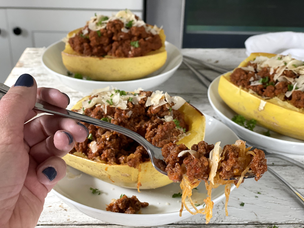 eating beefy marinara spaghetti squash