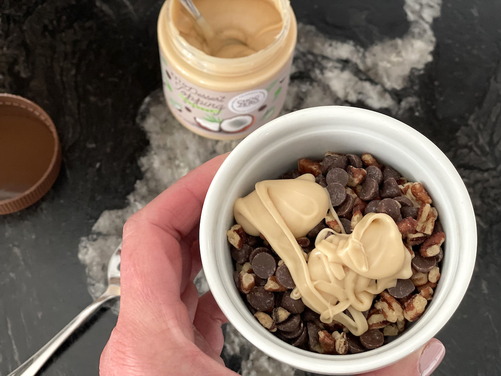 Choczero keto coconut topping on chocolates and nuts