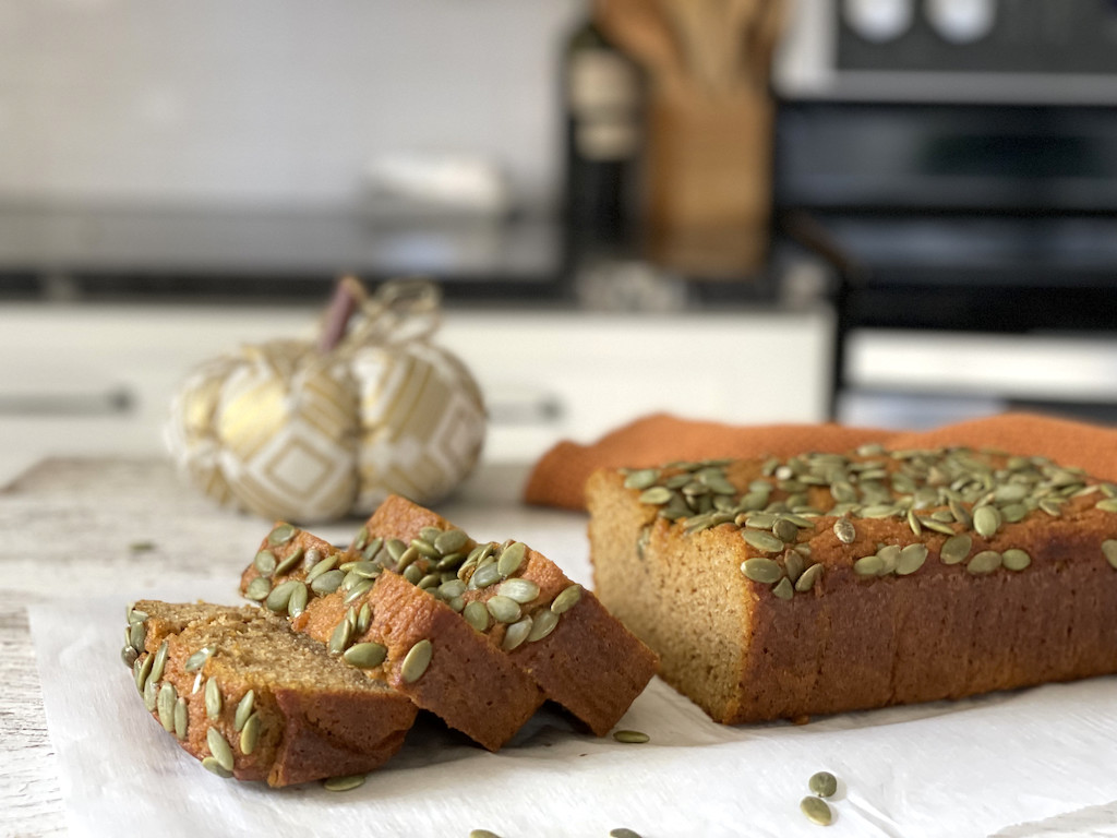 keto pumpkin bread topped with pumpkin seeds 