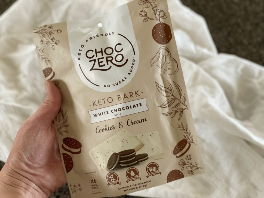 choczero Keto Bark holding cookies & cream bag 