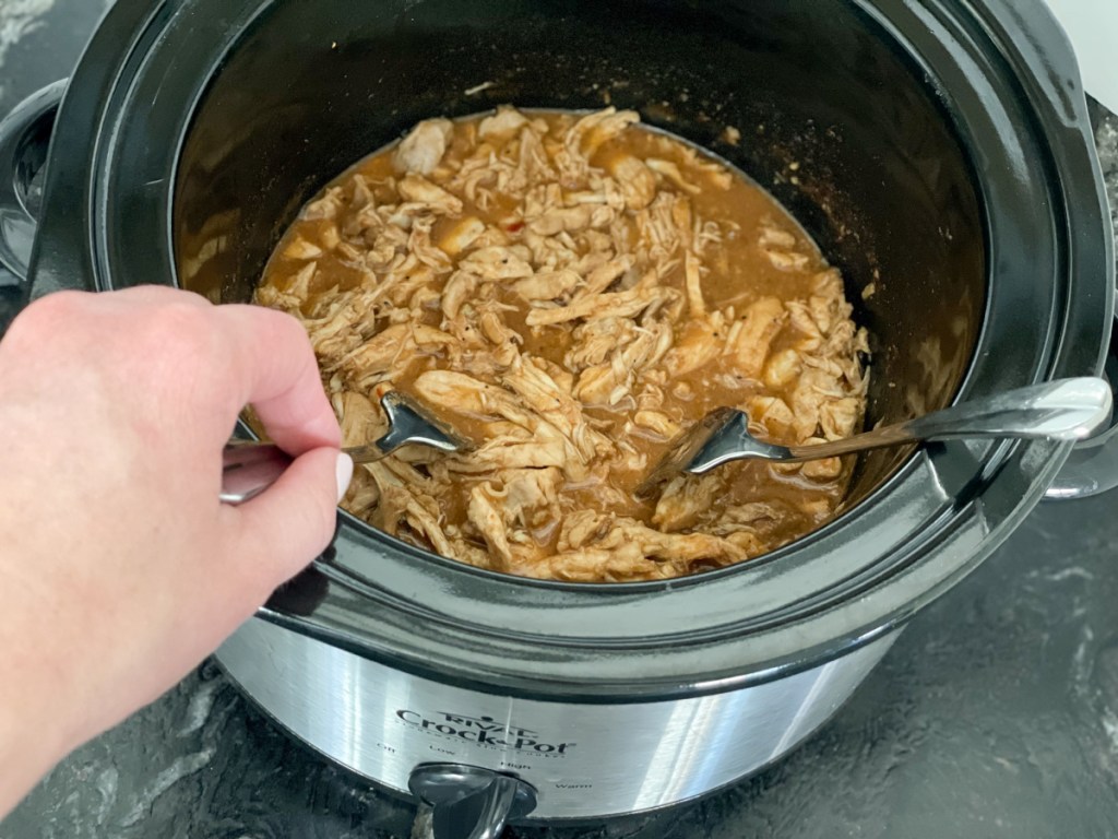 shredding keto crockpot bourbon chicken