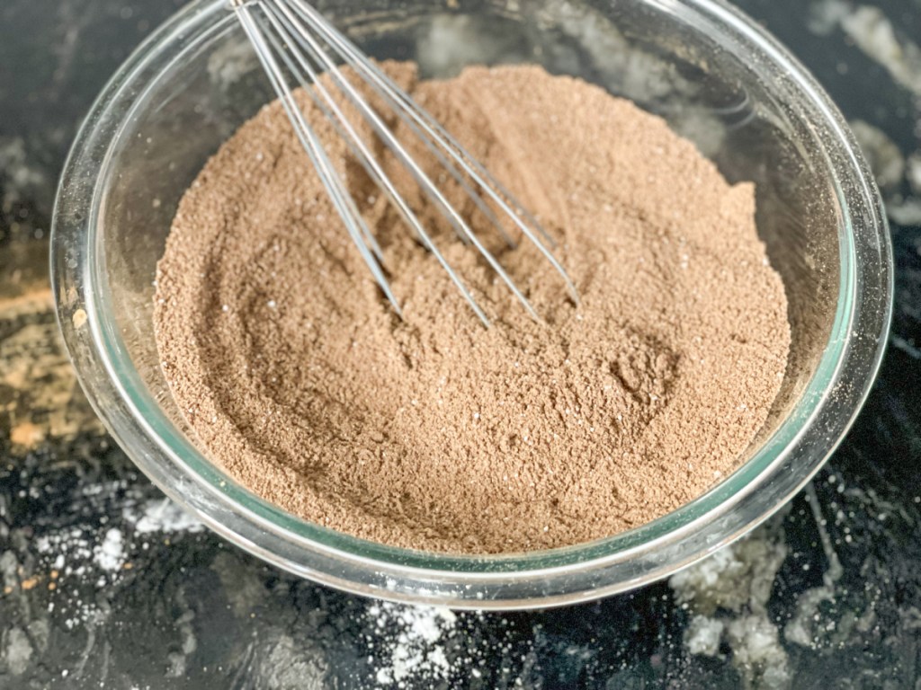 mixing dry ingredients for keto mint chocolate cupcakes