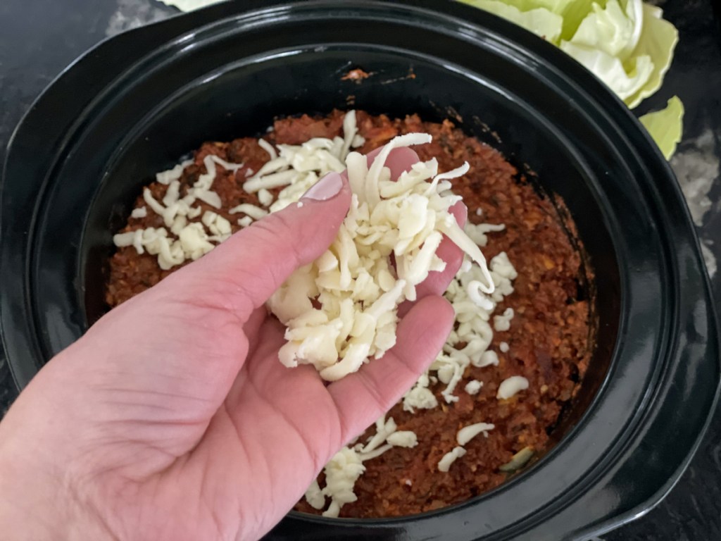 adding mozzarella to slow cooker low-carb lasagna