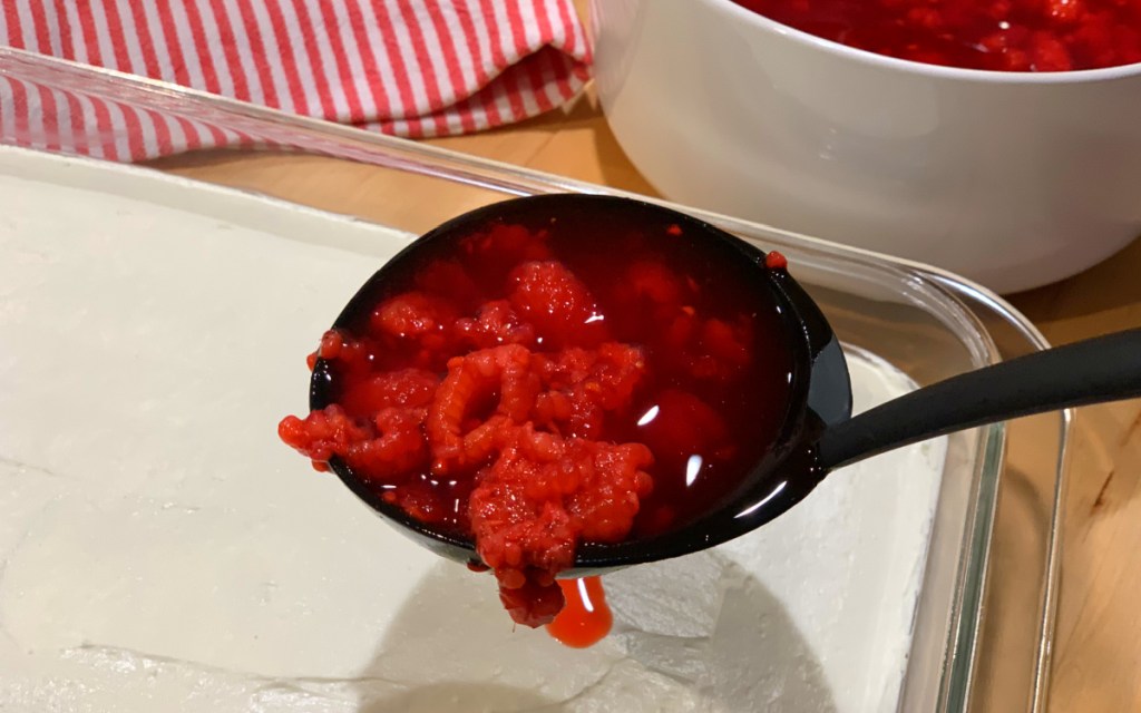 adding raspberry jello mix