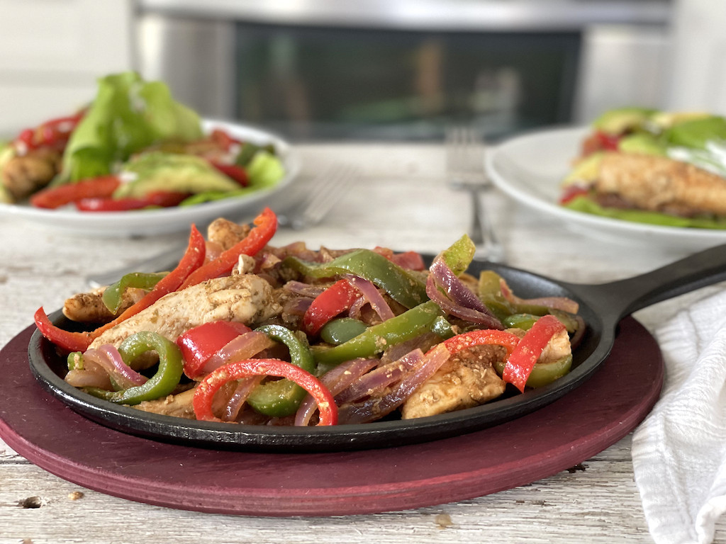 keto chicken fajita meal on warm skillet 