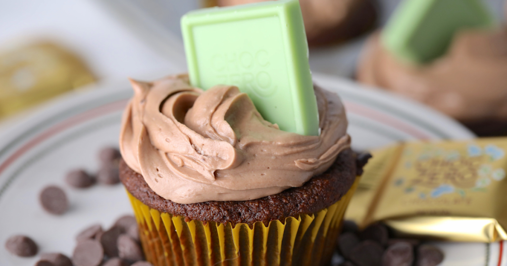 keto mint chocolate cupcake on plate with buttercream frosting