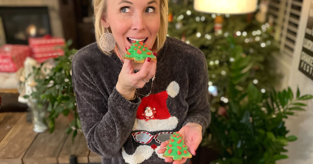 woman eating frosted keto sugar cookie 