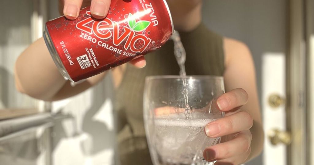 pouring Zevia zero sugar keto soda into a glass