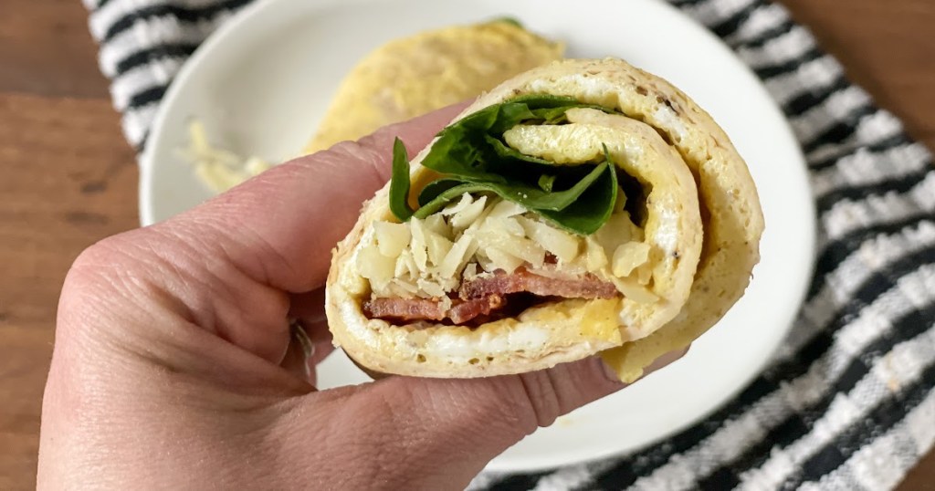 holding keto breakfast burrito