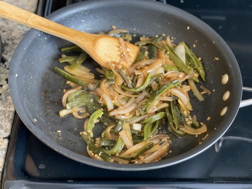 sautéing onions, garlic, poblanos for keto pollo a la crema