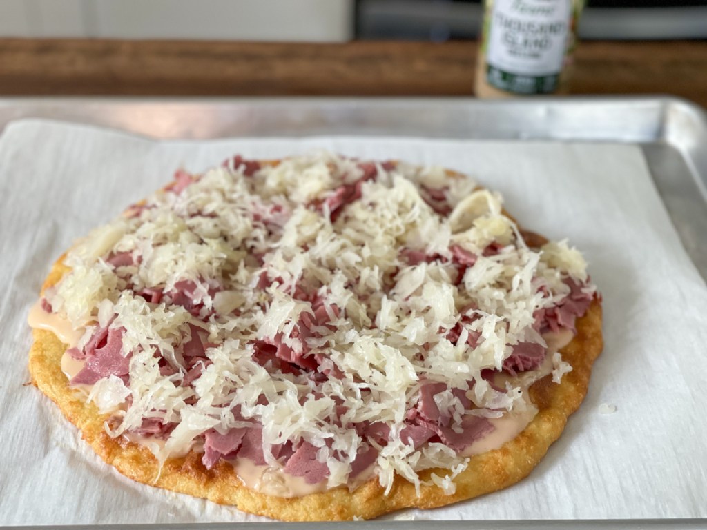 sauerkraut on reuben pizza