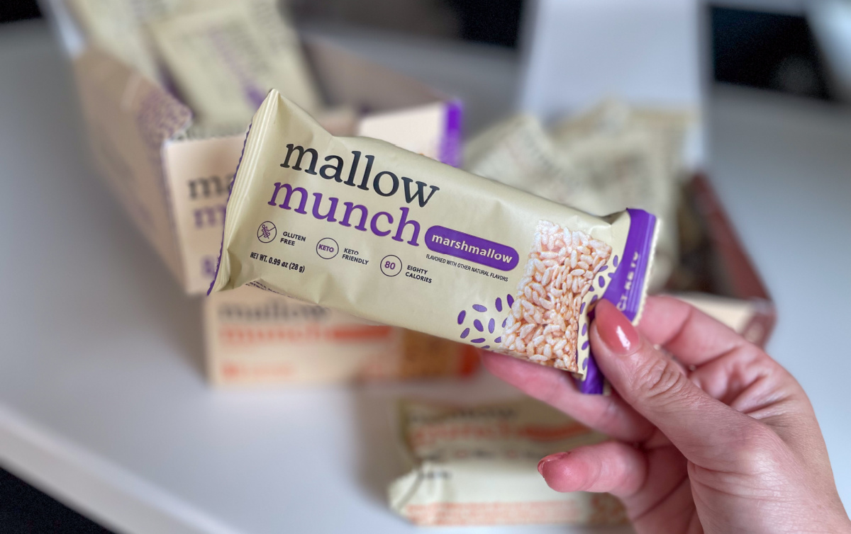 Hand holding up a Perfect Keto Mallow Munch Bar