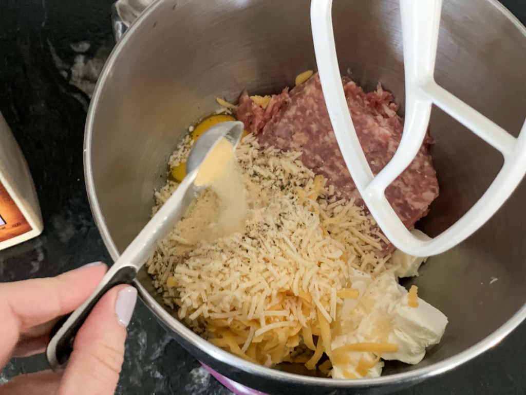 added seasonings to a mixing bowl