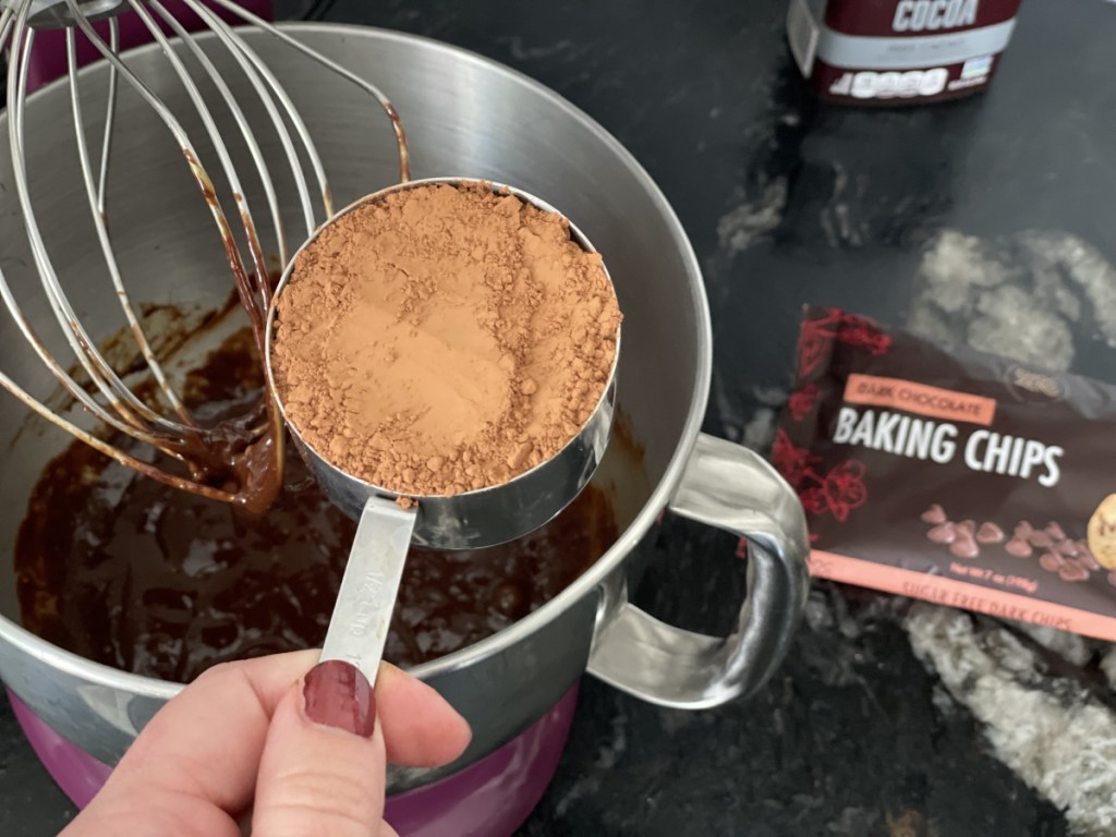 adding cocoa powder to keto flourless chocolate cake 