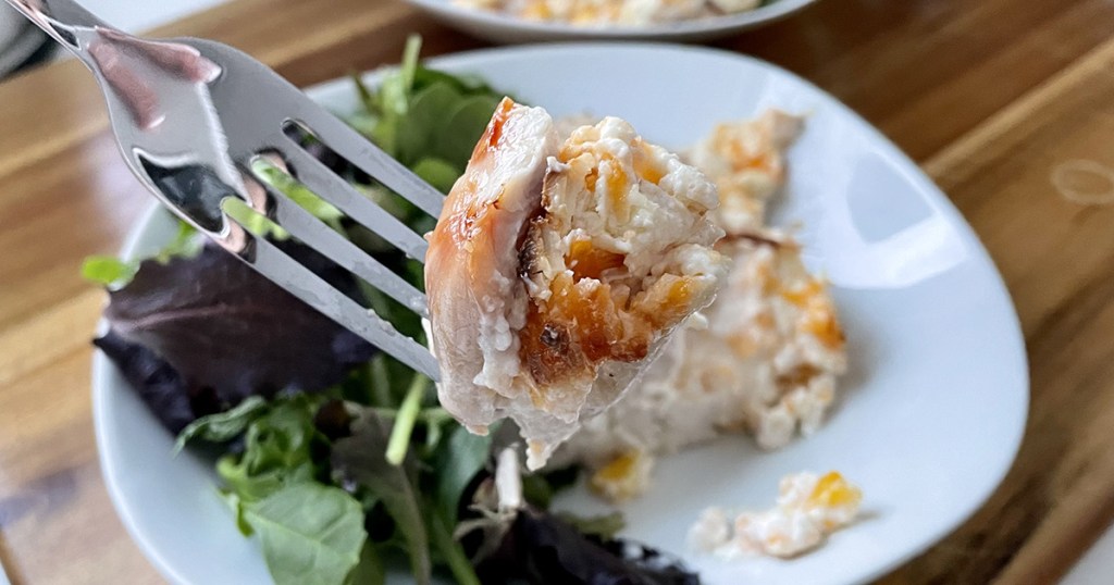 Forkful of keto cream cheese stuffed chicken