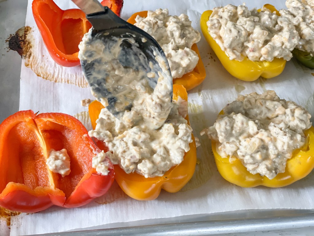 filling bell peppers with cream cheese and chicken mixture