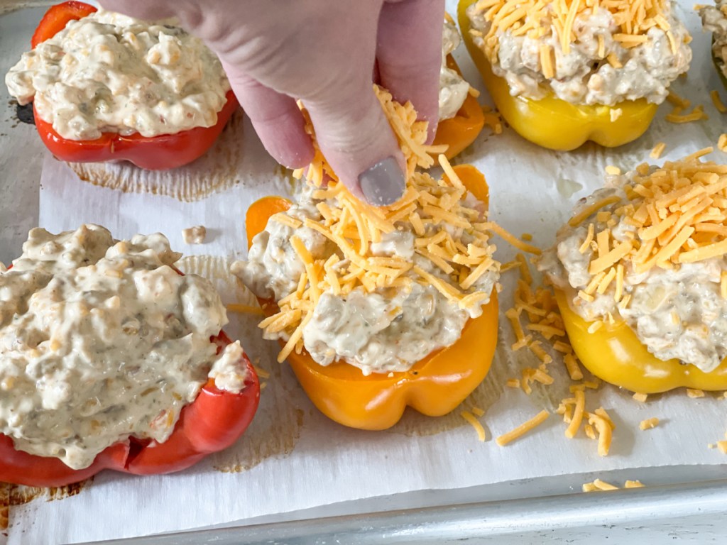 added shredded cheddar to stuffed bell peppers 