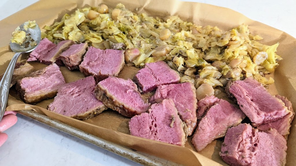 corned beef and cabbage on a baking sheet