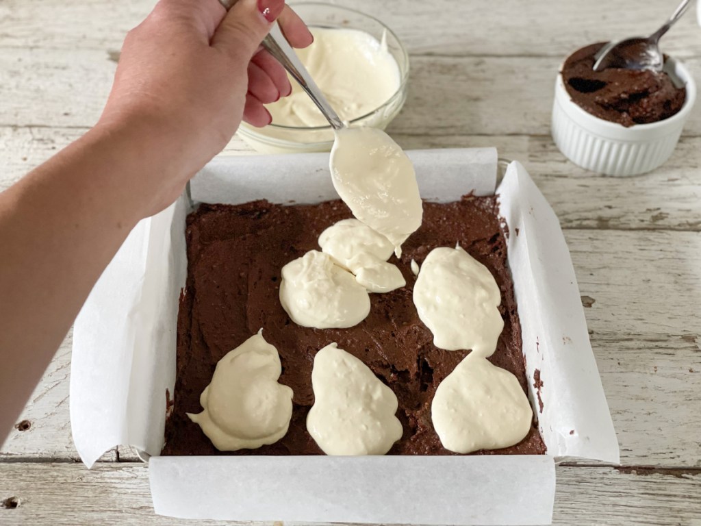 adding cream cheese to brownie batter 