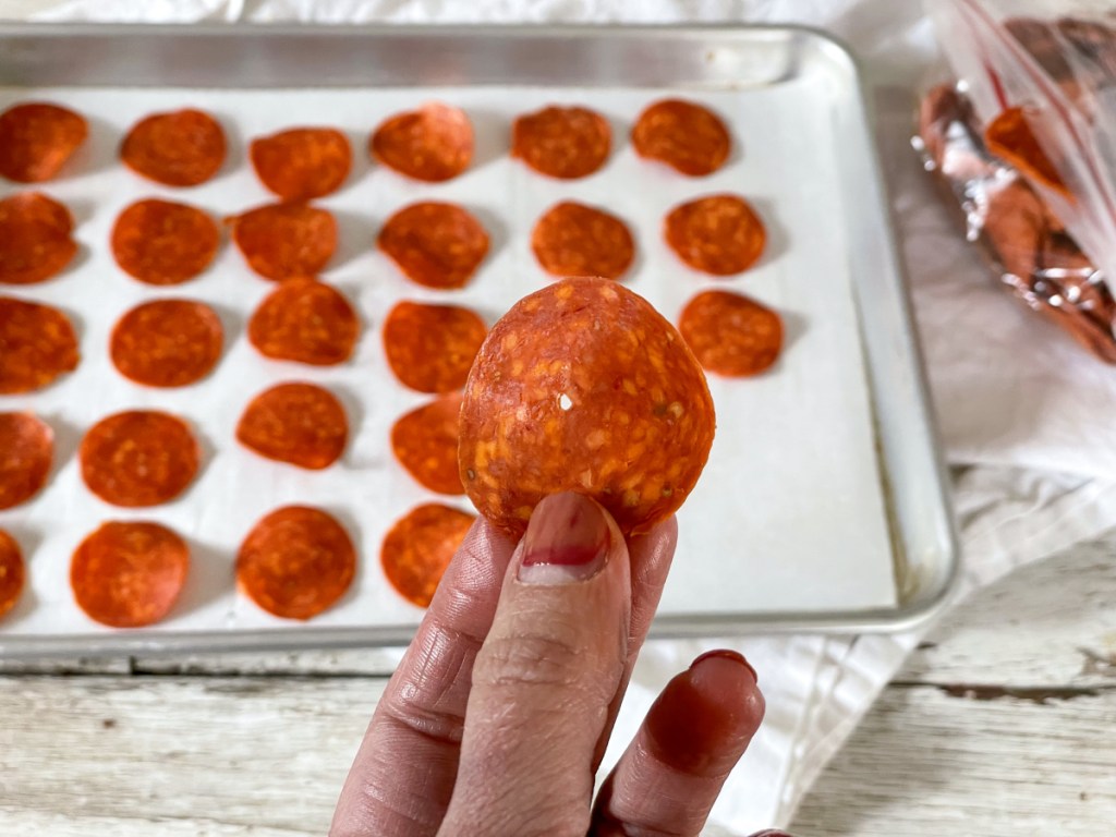 pepperoni slices on baking sheet 