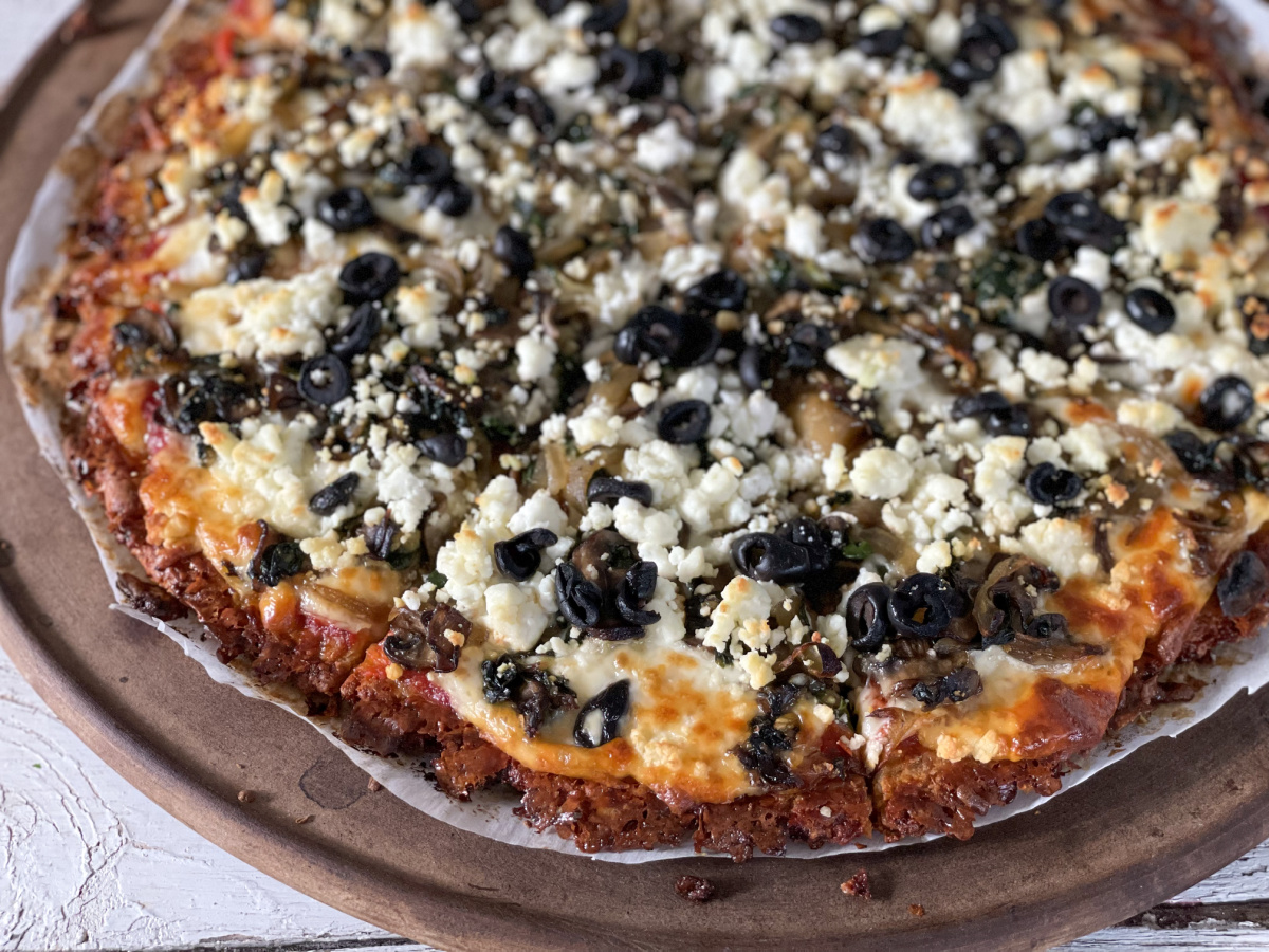 keto italian sausage crust pizza with cheese and olives