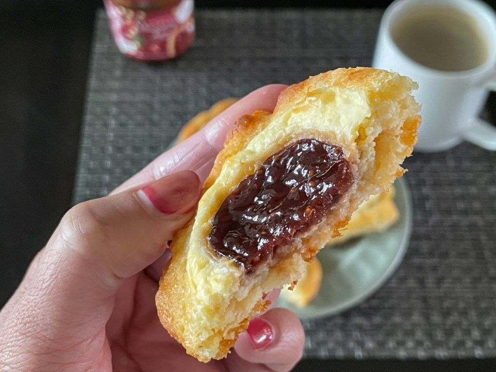 holding a keto strawberry cream cheese danish