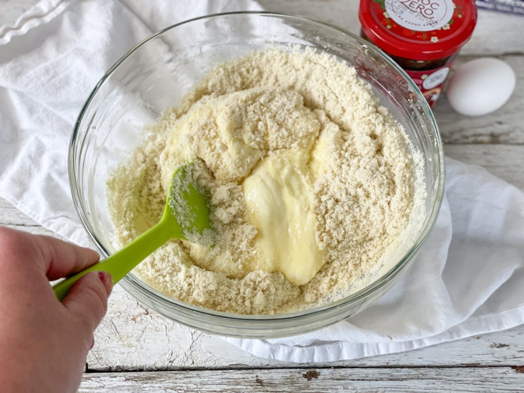 mixing dry ingredients with wet ingredients 