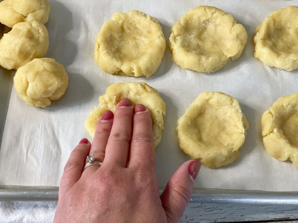 pressing a fathead danish dough ball down