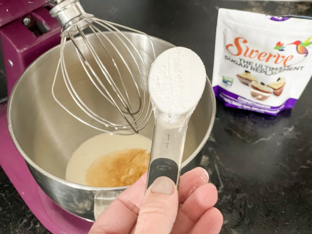 adding keto sweetener to mixing bowl