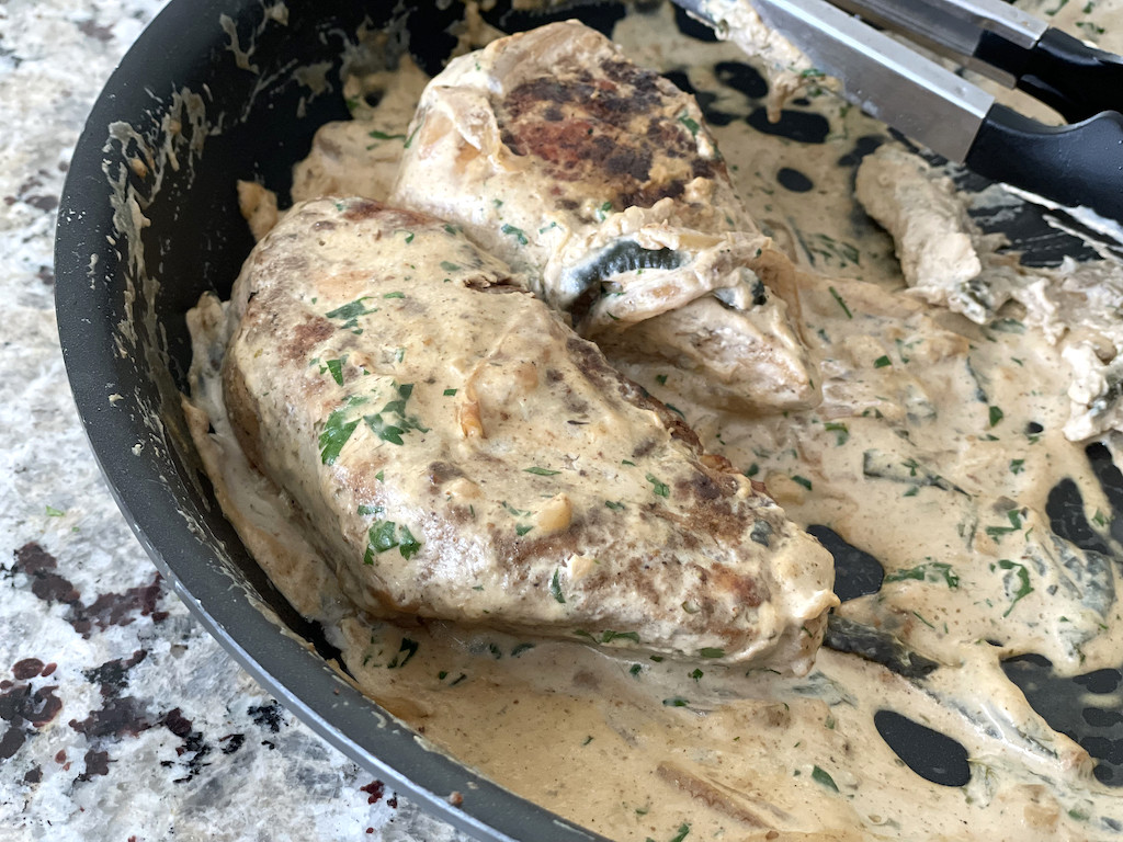 creamy chicken breasts in pan