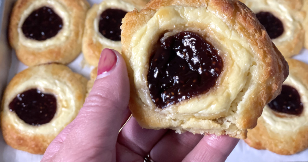 holding keto strawberry cream cheese danish 