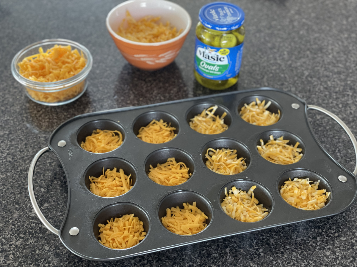 muffin pan with cheese in it to make keto pickle chips