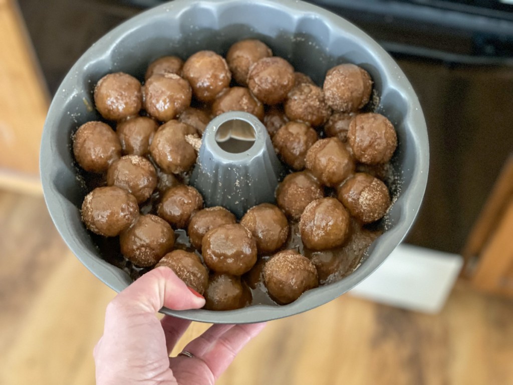 putting dairy-free monkey bread in the oven
