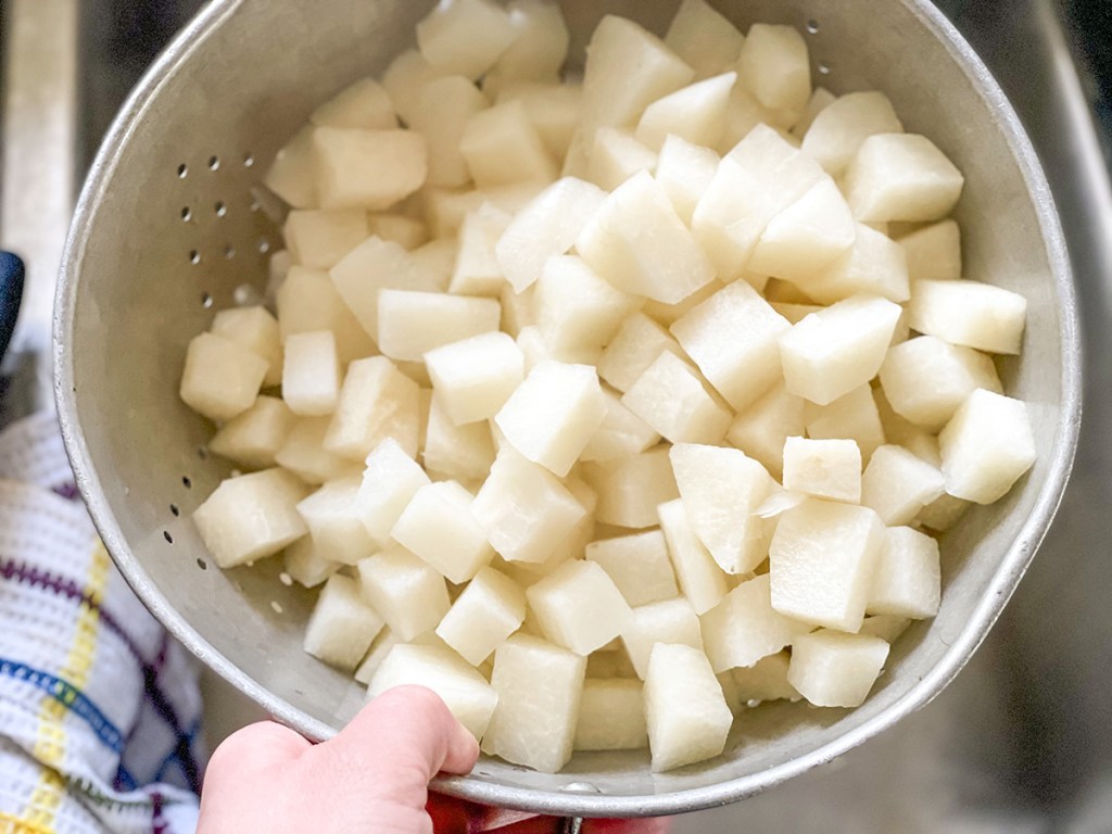 boiled jicama in a colander 