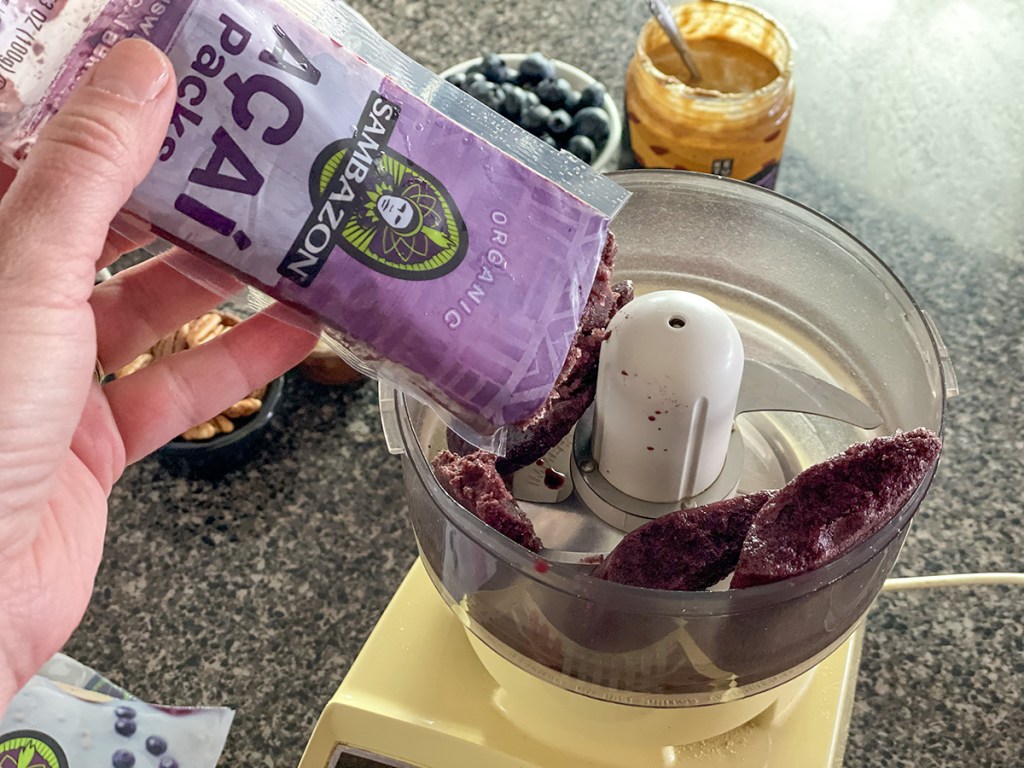 putting acai packet in food processor