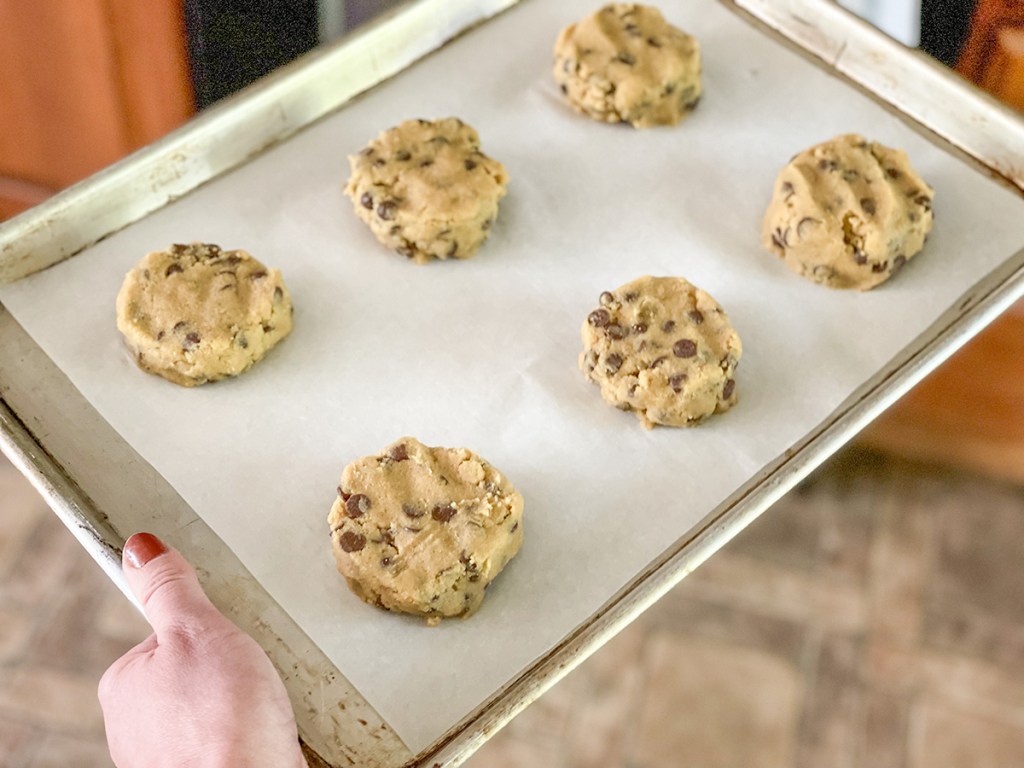 keto copycat crumbl cookie dough balls on baking sheet 
