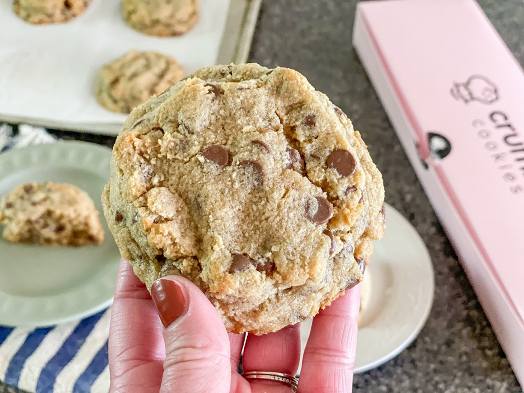 holding a keto copycat crumbl cookie