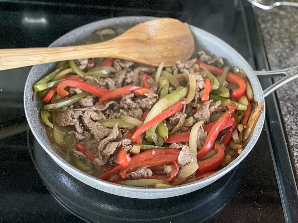 sautéd steak with peppers and onions 