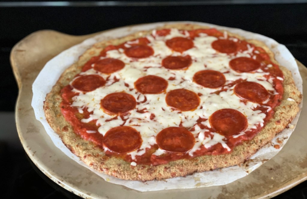 one of the best keto pizza crust recipes, a pork rind pizza crust