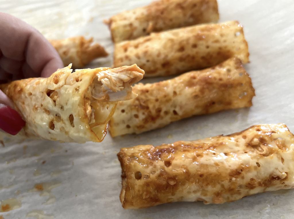 holding keto buffalo chicken rollup 