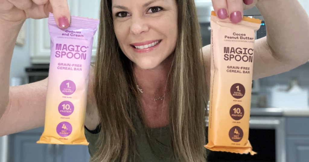 woman holding Magic Spoon cereal bars 