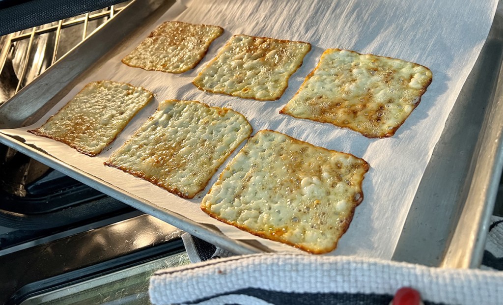 baked cheese slices on tray
