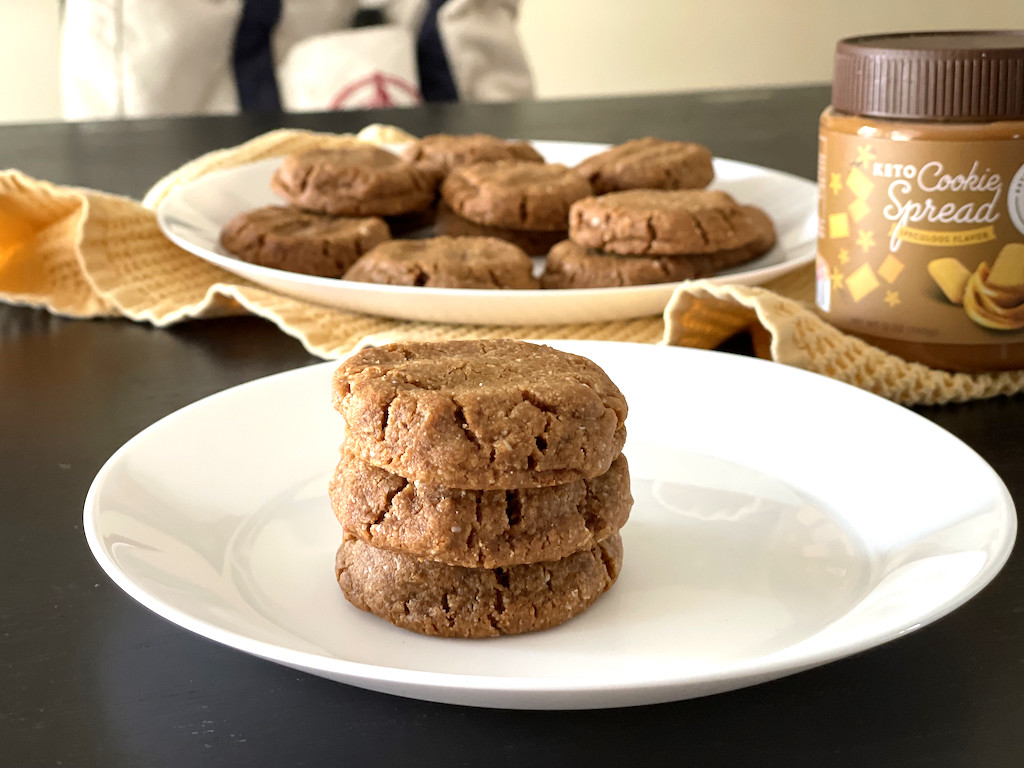 keto cookie butter cookies stacked up on plate 