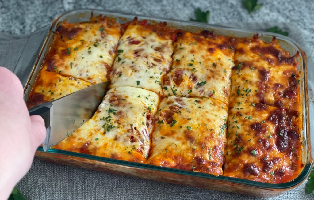 slicing into spaghetti squash casserole