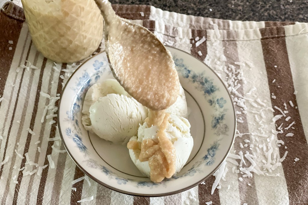 putting toasted coconut butter on ice cream