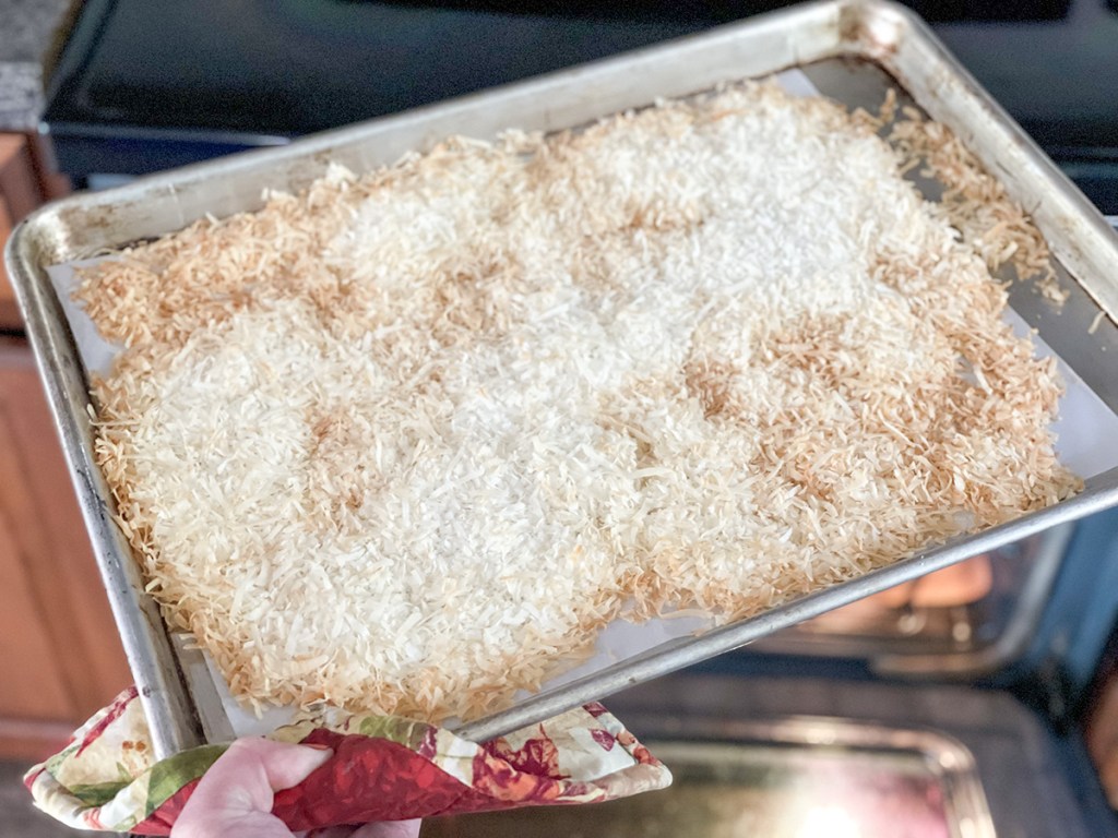 toasted coconut on a baking sheet 