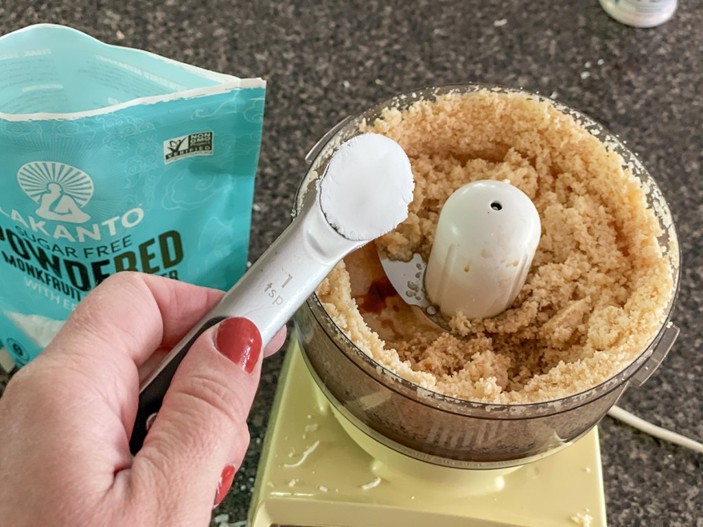 adding keto sweetener to coconut puree 