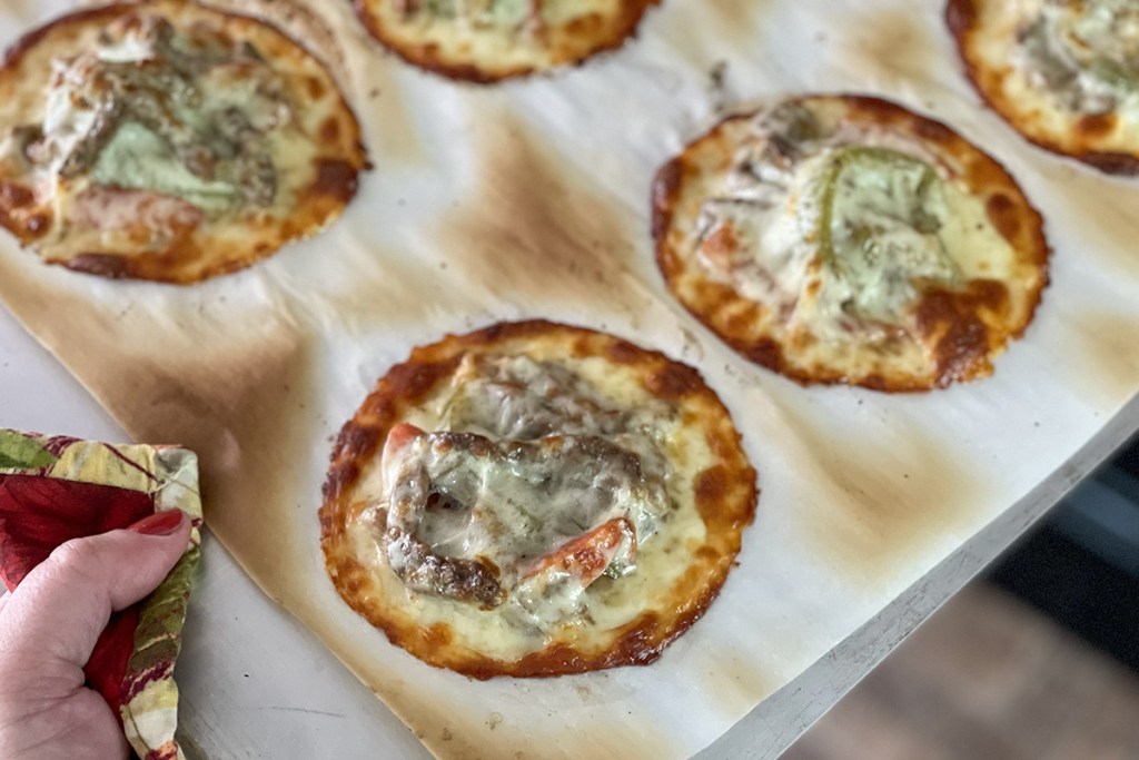 Philly cheesesteak keto ravioli on a baking sheet