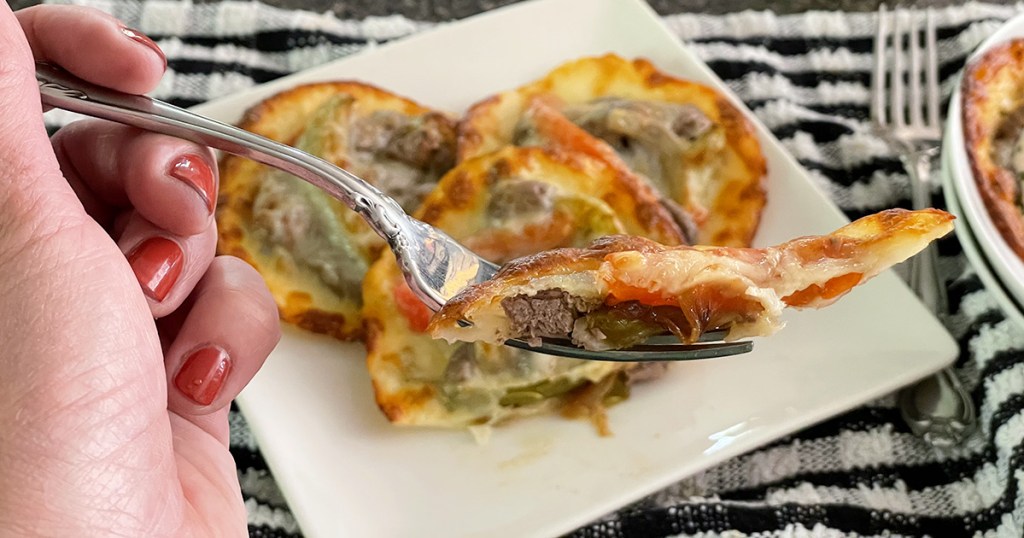 fork bite of Philly cheesesteak keto ravioli