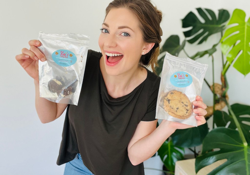 woman holding up bags of keto bakery goods